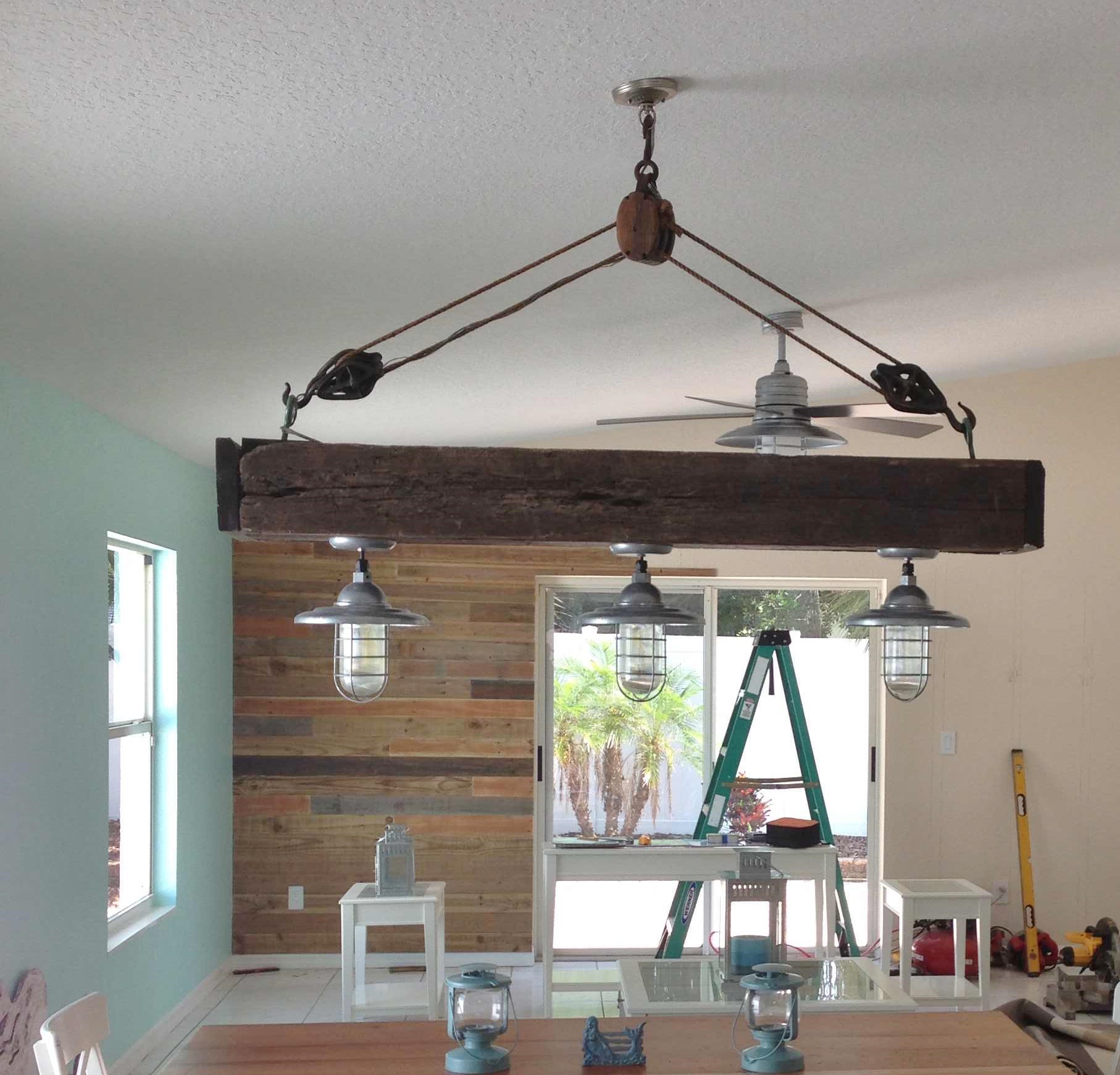 Atomic Pendants Flavor Remodeled Beach Home With Nautical