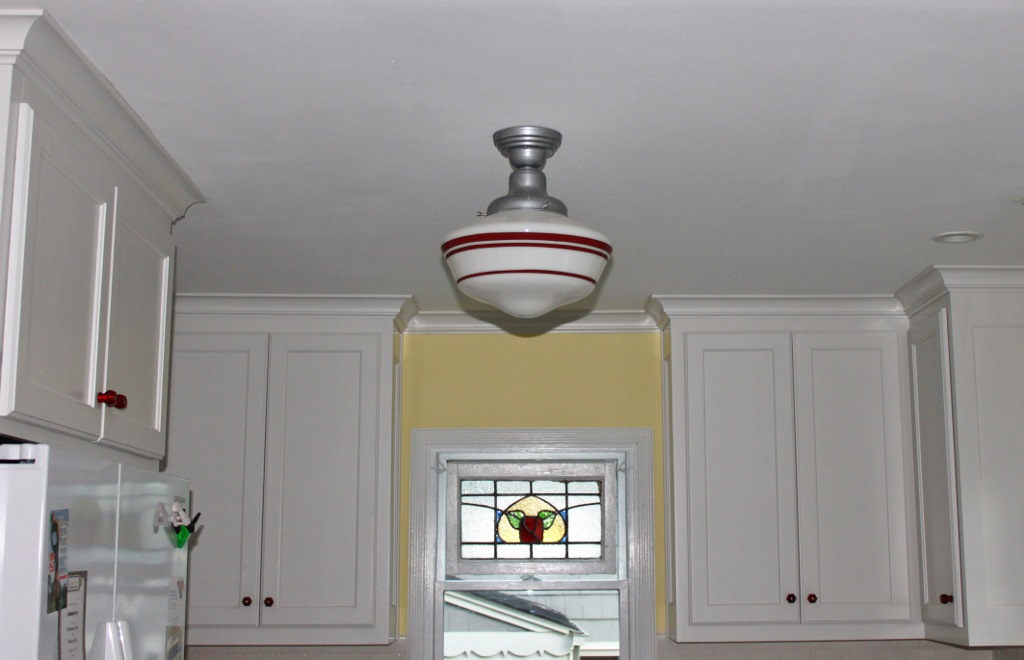 Schoolhouse Pendants Crowning Touch In Tudor Kitchen Remodel