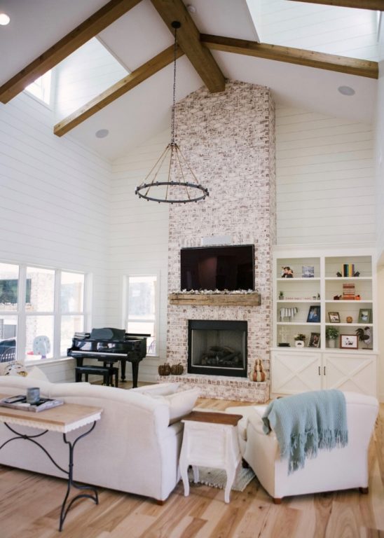 Farmhouse Chandelier Fills Expansive Living Room With Rustic